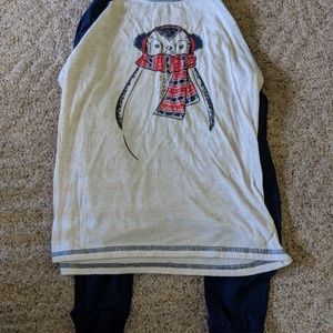 Cute pajama top, with navy sleeves and penguin